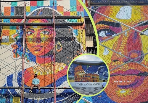 Oscar Olivares Sets Record with Giant Recycled Bottle Cap Mural