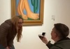 Douglas proposed in front of the painting "Abaporu" at Malba