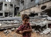 Palestinian Rahaf Nuseir, 10, looks on as she stands in front of her family's destroyed homes - Khalil Hamra - Palestine, State of